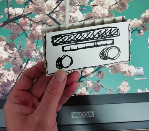 "got loads of this card going spare, which you could just cut radio shapes out of and draw on? Kinda (ghostly, haunting) old Paddington Bear style... "
